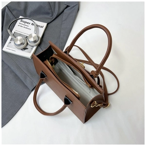 Three-layer interior structure of brown lychee grain leather handbag for work