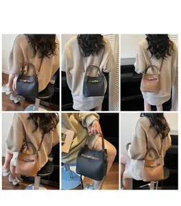 Sac seau en cuir à motif litchi noir et marron avec options de bandoulière amovible