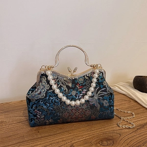 Blue vintage embroidered evening bag with gold floral patterns and pearl tassels