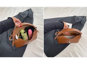 Détail de la grande capacité intérieure du sac en cuir marron avec une poche interne