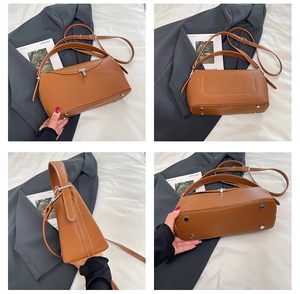 Vues détaillées d'un sac à main en cuir grainé marron avec fermoir en T et pieds en métal
