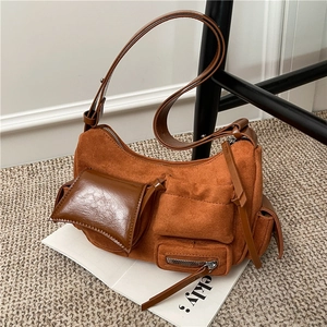 Retro brown multi-pocket crossbody bag with vintage suede texture and leather stitching