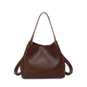 Minimalist deep brown polished leather bucket handbag with long shoulder straps for women