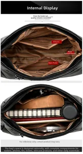 Vue intérieure du sac à bandoulière en cuir grainé noir avec plusieurs compartiments et poches
