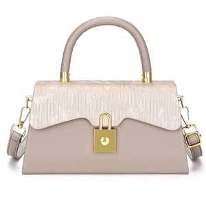 Elegant trapezoid box handbag with vintage gold lock in beige gray textured leather