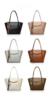 Color display of stylish soft leather tote bags with cute bear charms in six colors