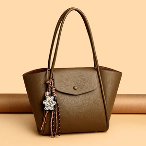 Litchi pattern leather tote bag in dark khaki with a stylish leopard bear charm