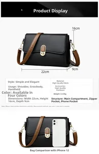 Detail view of the black leather shoulder bag with dimensions 22x16x9cm and internal pocket layout