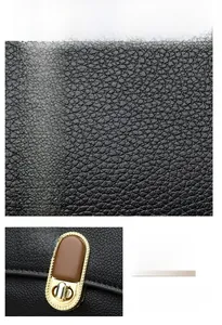 Close-up of black lychee grain leather and golden metal twist lock on shoulder bag