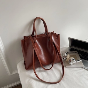 Retro dark brown large capacity tote bag with long shoulder strap and accordion sides