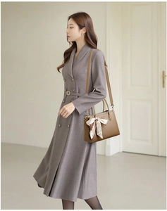 Brown lychee leather shoulder bag with polka dot scarf detail on model's side view