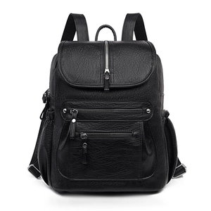 Minimalist black faux leather backpack with multiple pockets for women travel