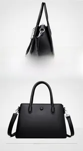 Front and back views of a black pebbled leather handbag with silver hardware and silk scarf