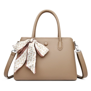 Elegant khaki lychee grain leather handbag with floral silk scarf and top handle strap