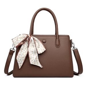 Dark brown pebbled leather handbag with silk scarf and detachable shoulder strap