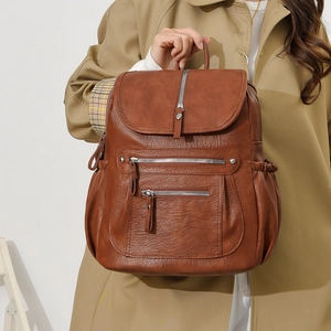 Brown faux leather backpack with multi-zipper pockets and vintage texture for women