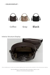 Macro detail of litchi texture bucket bag featuring metal buckle and removable pouch