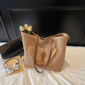 Sac fourre-tout en paille avec anses en cuir marron et poche avant pour la plage
