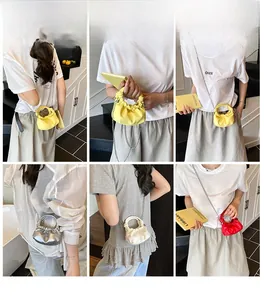Chic ruched dumpling bags in multiple colors with ring handles and chain straps