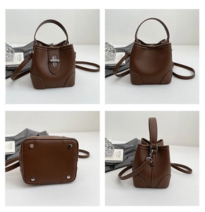 Detailed views of brown pebble leather bucket bag with metal lock and base studs