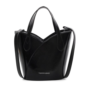 Glossy black bucket bag with V-shaped opening and top handle for shoulder or crossbody use