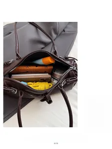 Deep brown pebble leather bag interior showing spacious capacity for daily essentials