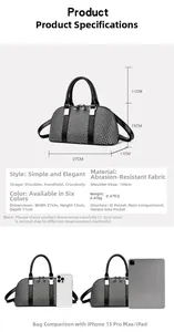 Detailed size specifications of the black and white woven Boston handbag for women