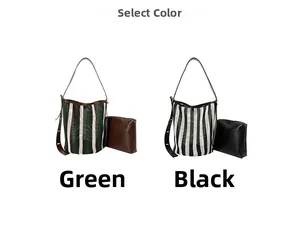 Detail view of contrast stripe tote bags in green and black with leather bucket style sets
