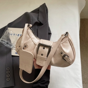 Beige crescent underarm bag in litchi faux leather with buckle and small pouch