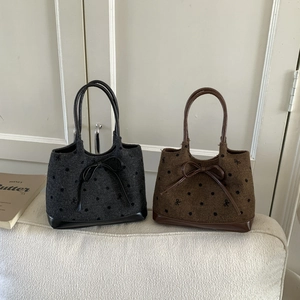 Polka dot embroidered tweed tote bag with leather bow in black and brown colors