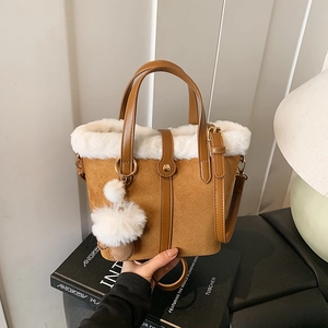Brown faux suede tote bag with white faux fur trim and gold hardware for autumn winter