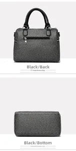 Detail view of black woven tote bag showing back zipper pocket and wide sturdy base