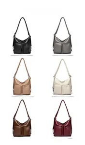 Multiple colors of vintage soft leather hobo bags in black, grey, khaki, and brown
