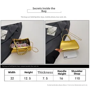 Detailed size guide and capacity for the gold glitter evening box bag with pearl handle