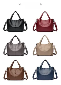Detail view of various colors for the pebble leather tote bag with shoulder straps