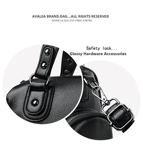 Detailed macro view of glossy silver metal hooks and high-quality leather texture on bag