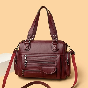 Deep red multi-pocket motorcycle bag in premium lychee leather with crossbody strap