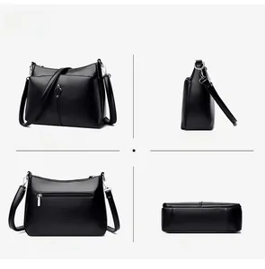 Detailed views showing the leather texture, back zipper pocket, and base of the black handbag
