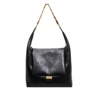Quilted black leather shoulder bag with gold chain strap and turn-lock closure