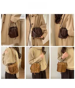 Detail shots of fringe bucket bags in brown and khaki with adjustable crossbody straps