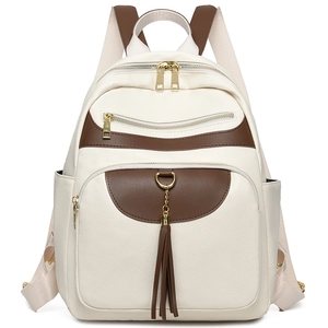 Large capacity beige backpack with brown trim, tassel detail and multi-pocket design