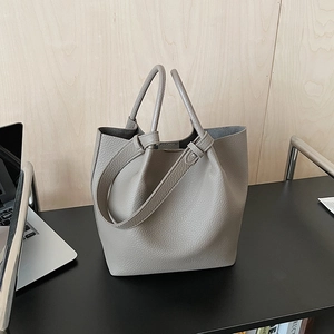 Chic grey lychee leather bucket bag with top handles for daily office commute