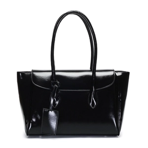 Classic black patent leather tote bag with glossy finish and long shoulder straps