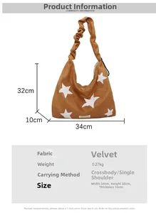Detail of brown faux suede bag with white star pattern and dimensions 34x32x10cm