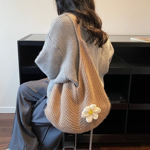 Brown crochet knit hobo bag with large 3D flower detail for daily commute and vacation