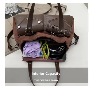 Interior view of spacious retro leather handbag with umbrella, phone, and wallet