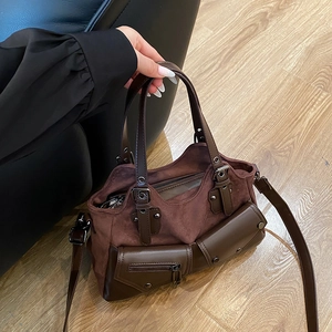 Retro dark brown crossbody motorcycle bag with suede texture and dual handles