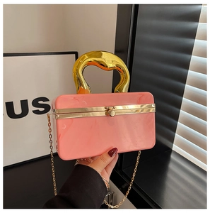 Pink marble acrylic evening clutch bag with golden lava handle and metal chain strap