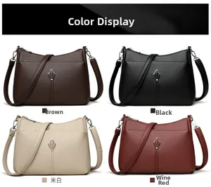 Color display of crossbody bags in brown, black, off-white, and burgundy leather