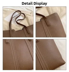 Close-up of deep brown lychee grain leather tote bag with white stitching and metal studs